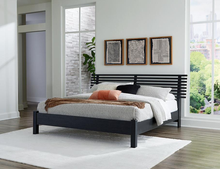 Danziar King Panel Bed with Mirrored Dresser, Chest and 2 Nightstands